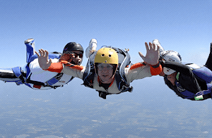 Three people skydiving
