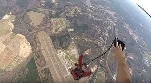 Bird’s eye view of the ground while a person is skydiving